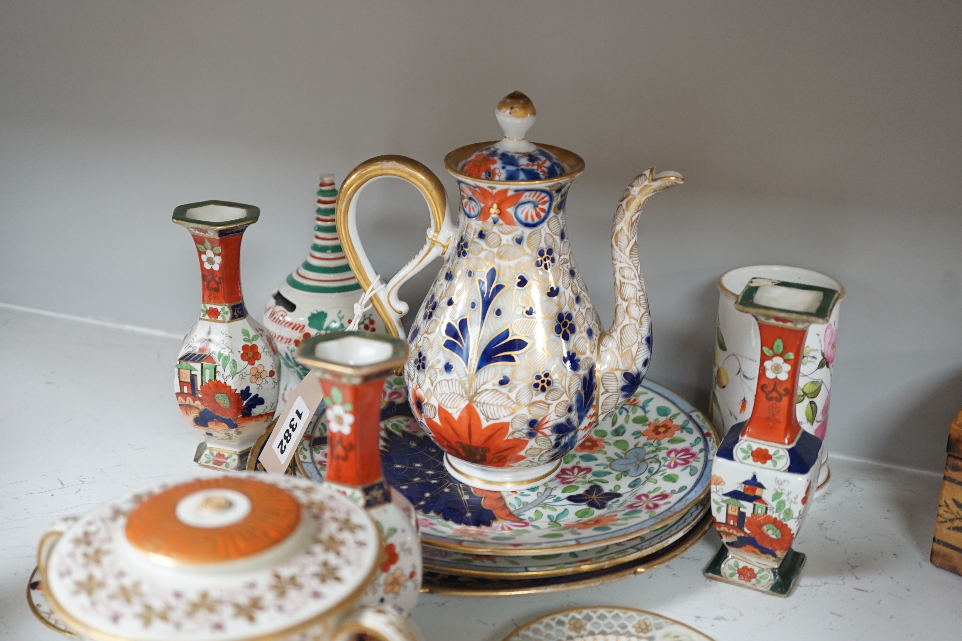 A selection of English porcelain and ceramics, to include a two handled Wedgwood Queensware urn, cover and stand, c.1800, two 19th century Worcester pierced bordered dishes, etc.